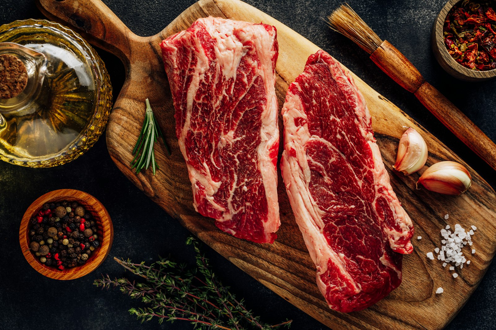 Steaks on a cutting board, representative photo